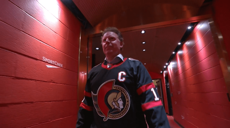 Daniel Alfredsson walks from the Ottawa dressing room to centre ice with a wry smirk on his face.